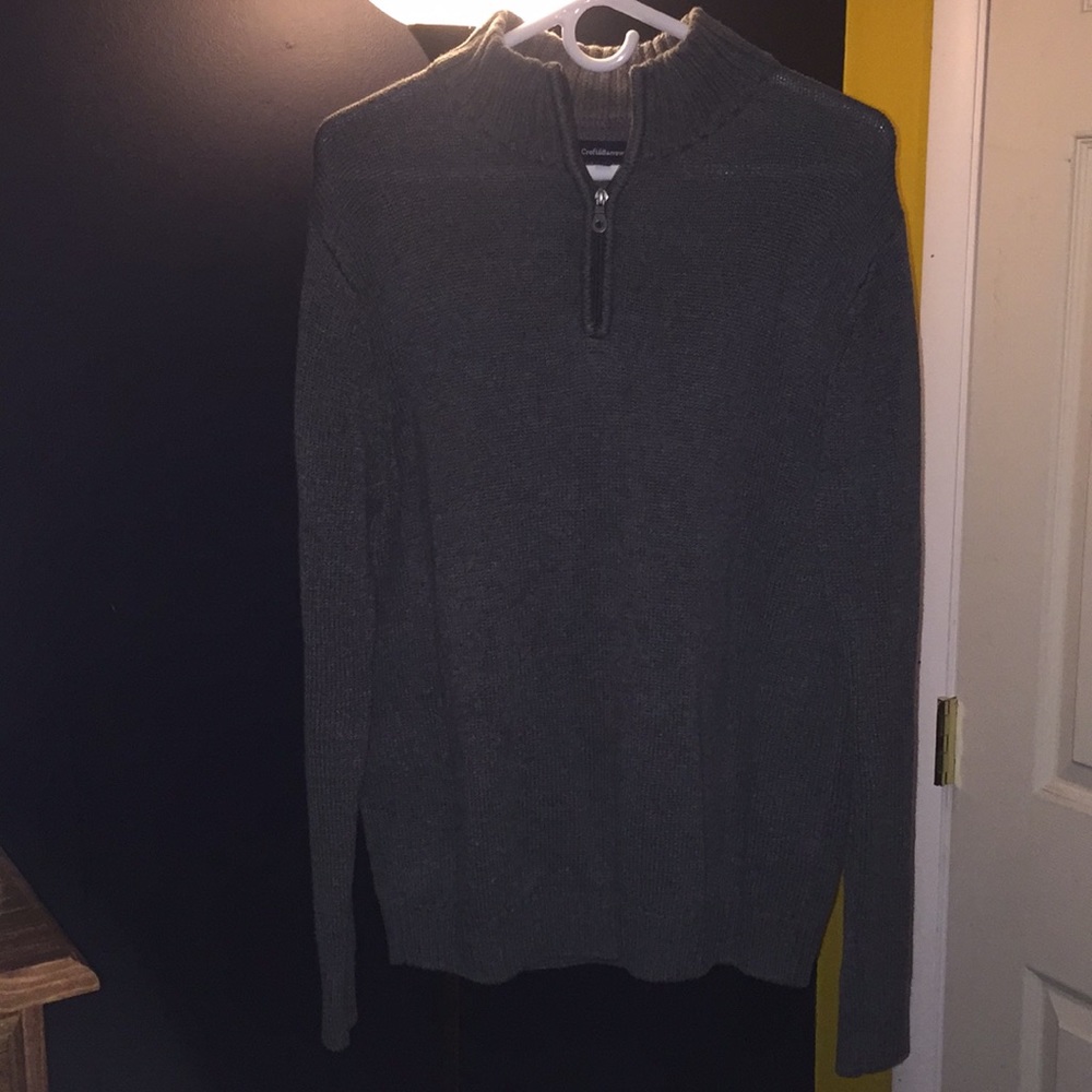 Quarter-zip sweater.